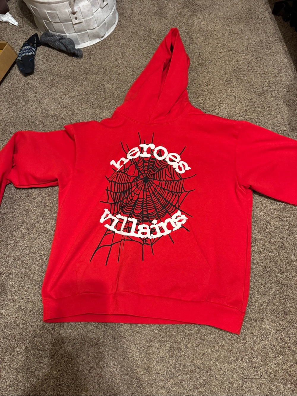 Red Graphic Pullover Hoodie with 'Heroes Villains' Web Design